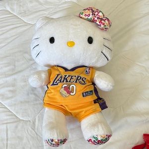 Hello kitty wearing laker’s jersey